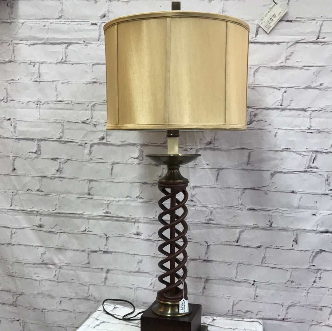 Lamp with twisted base