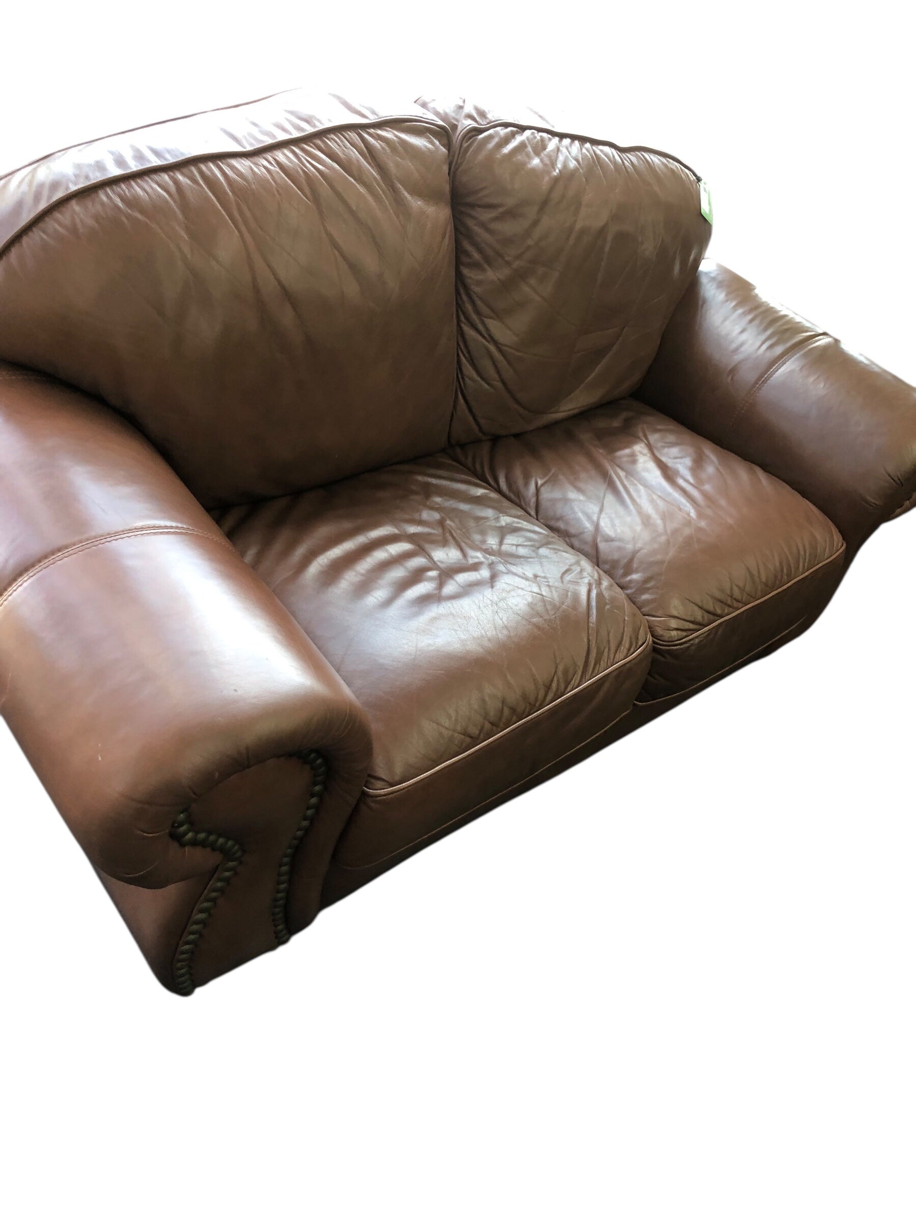 Light brown leather loveseat