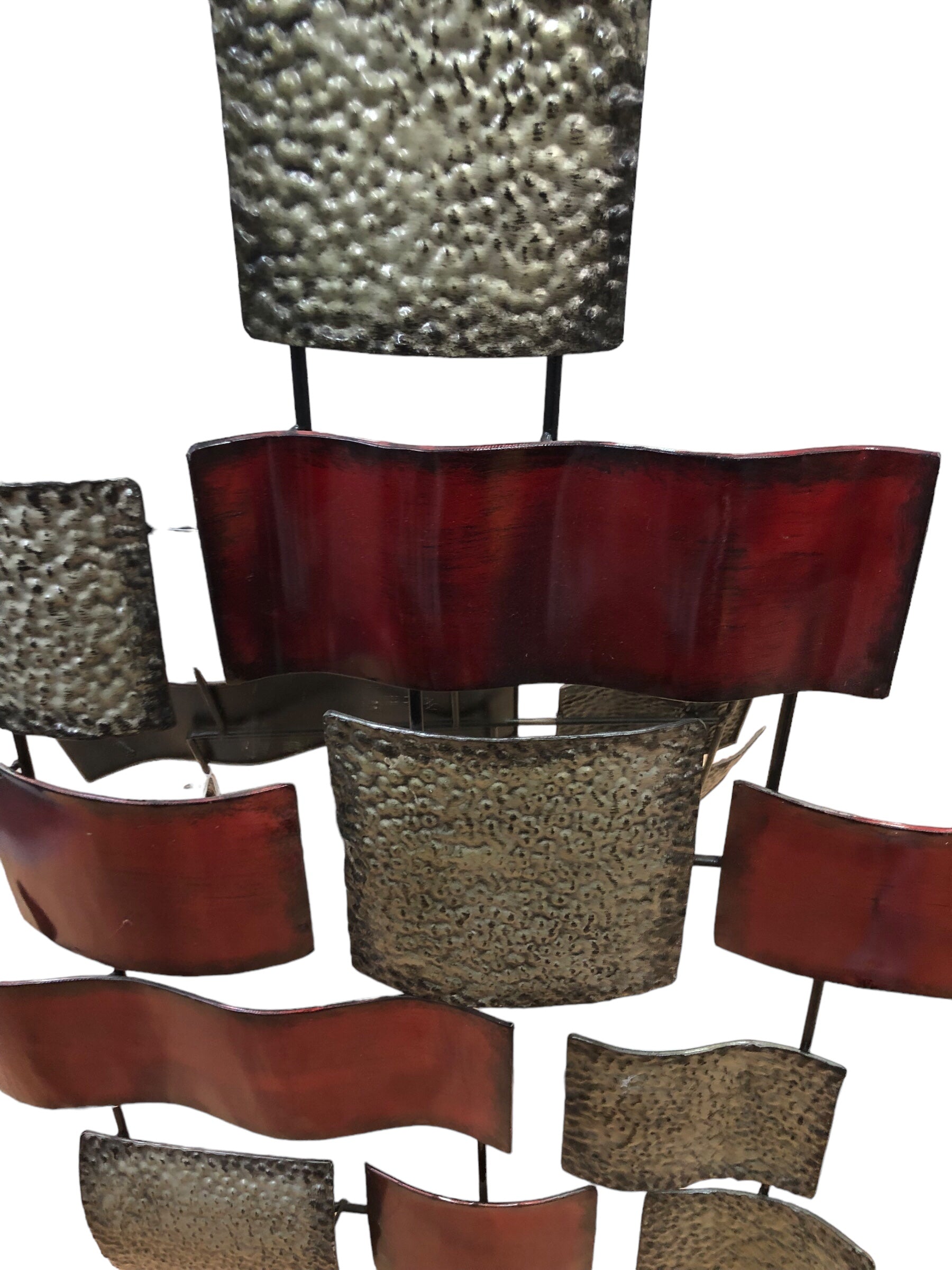 Red and Hammered Metal Wall Decor