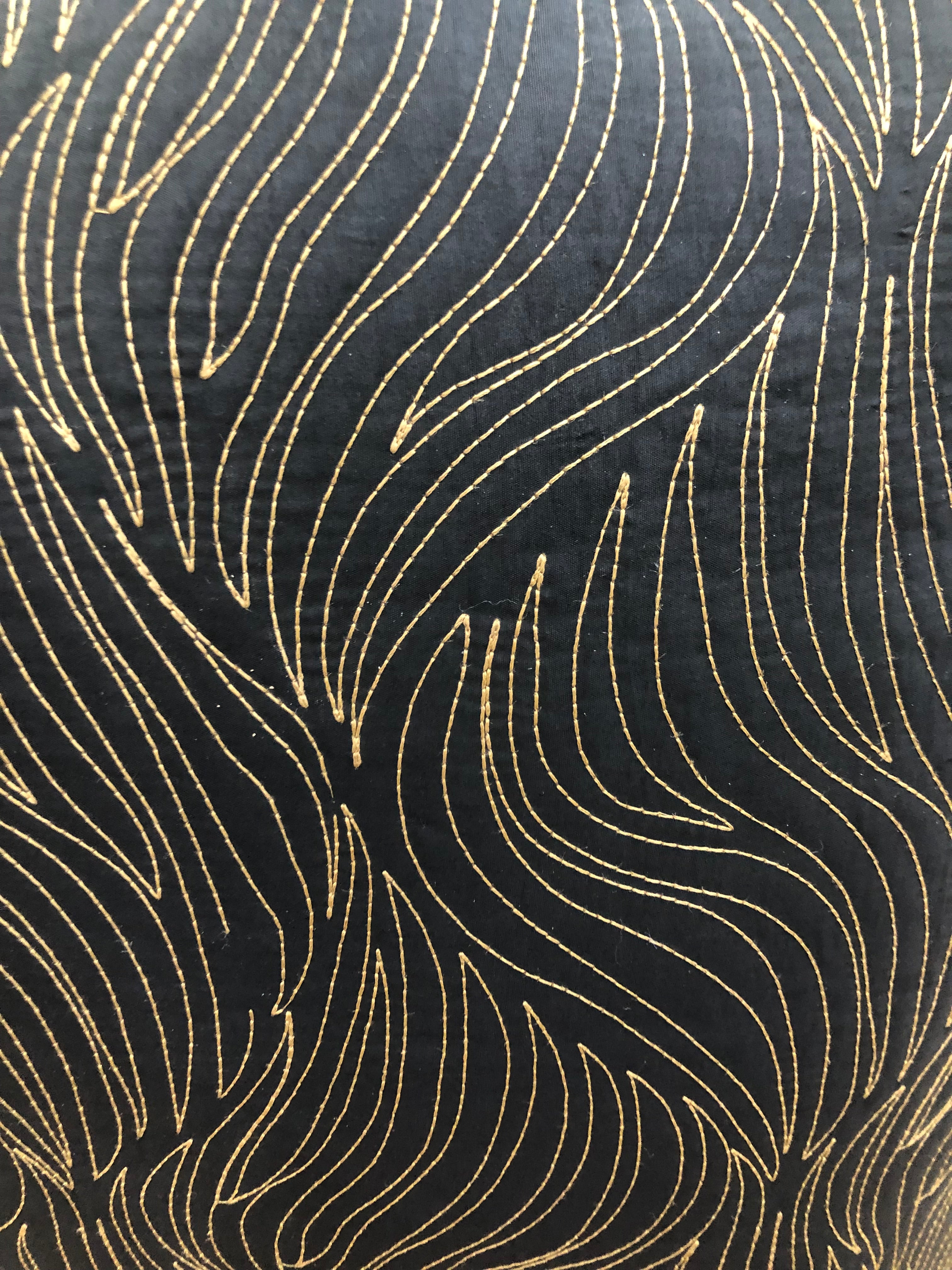 Black accent pillow/ gold design