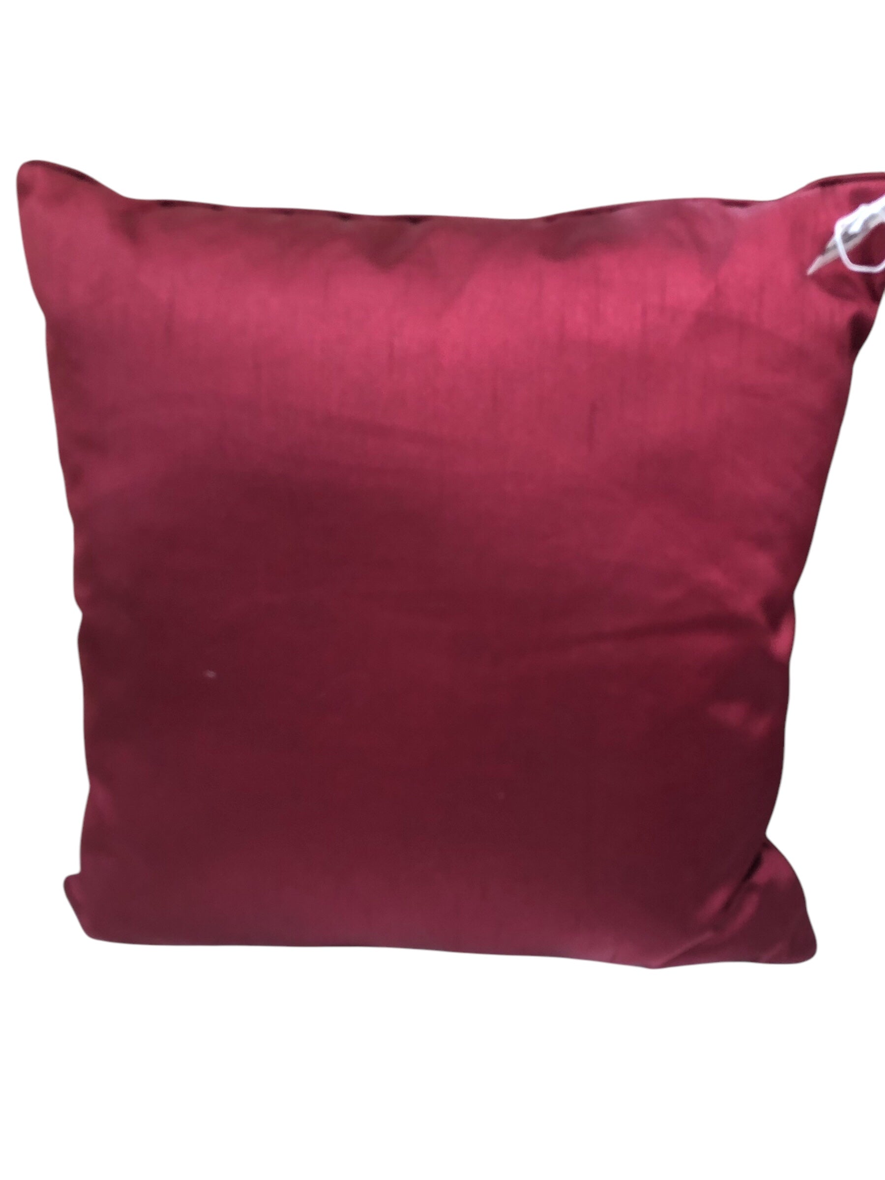 Red accent pillow