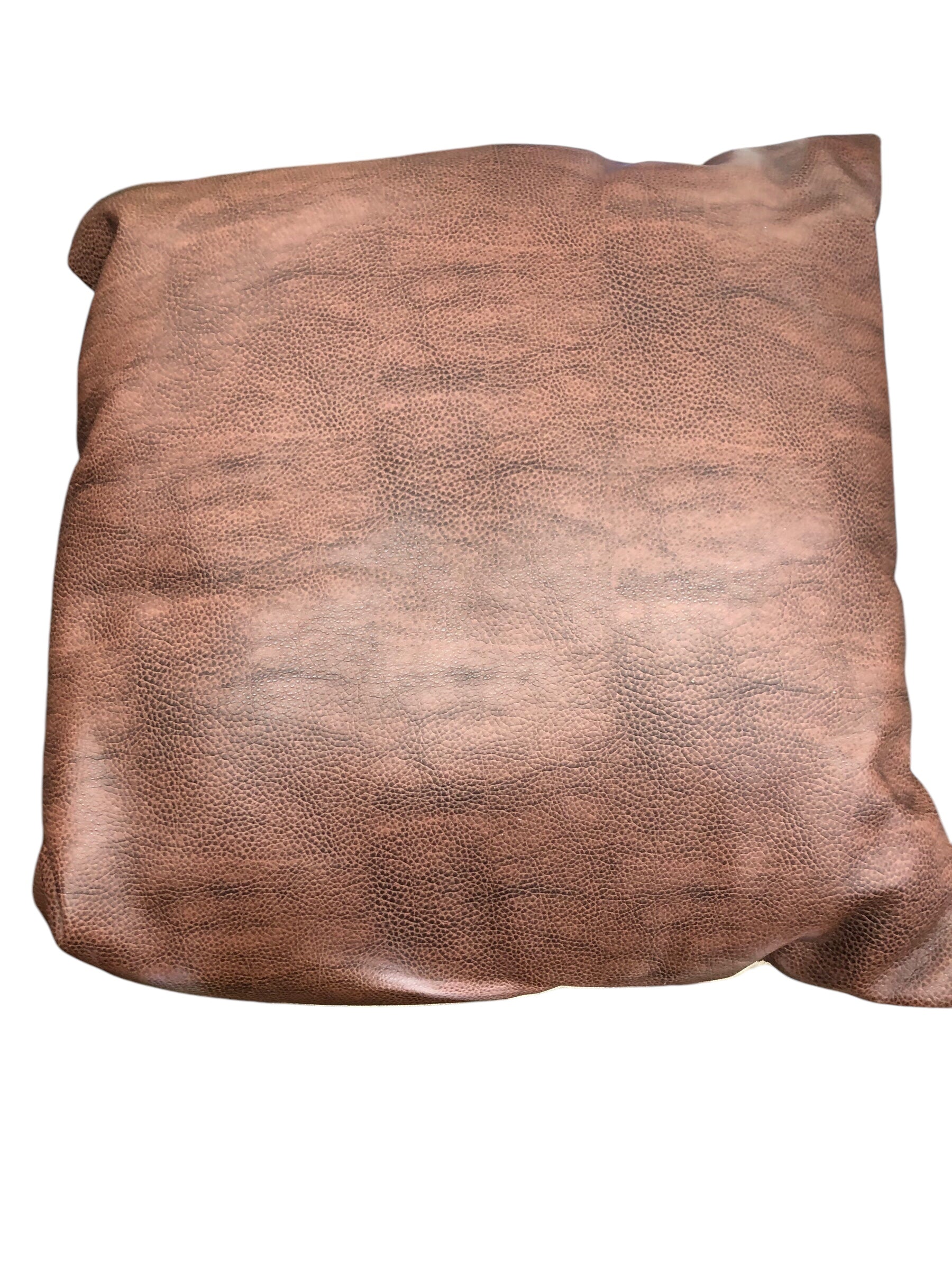 Brown faux leather pillow