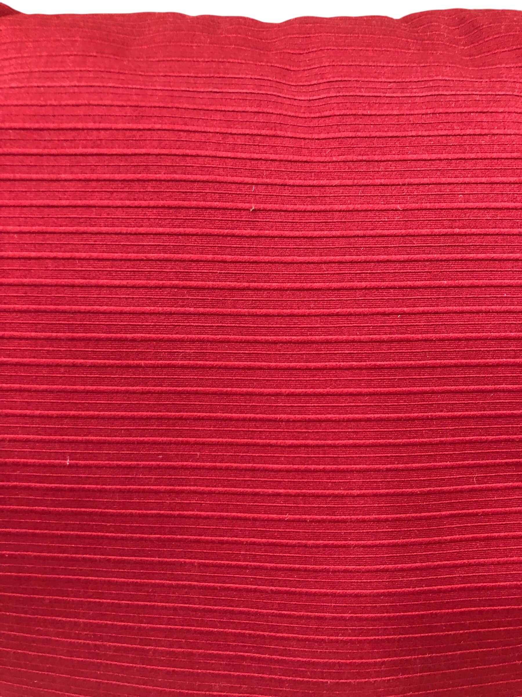 Red textured accent pillow