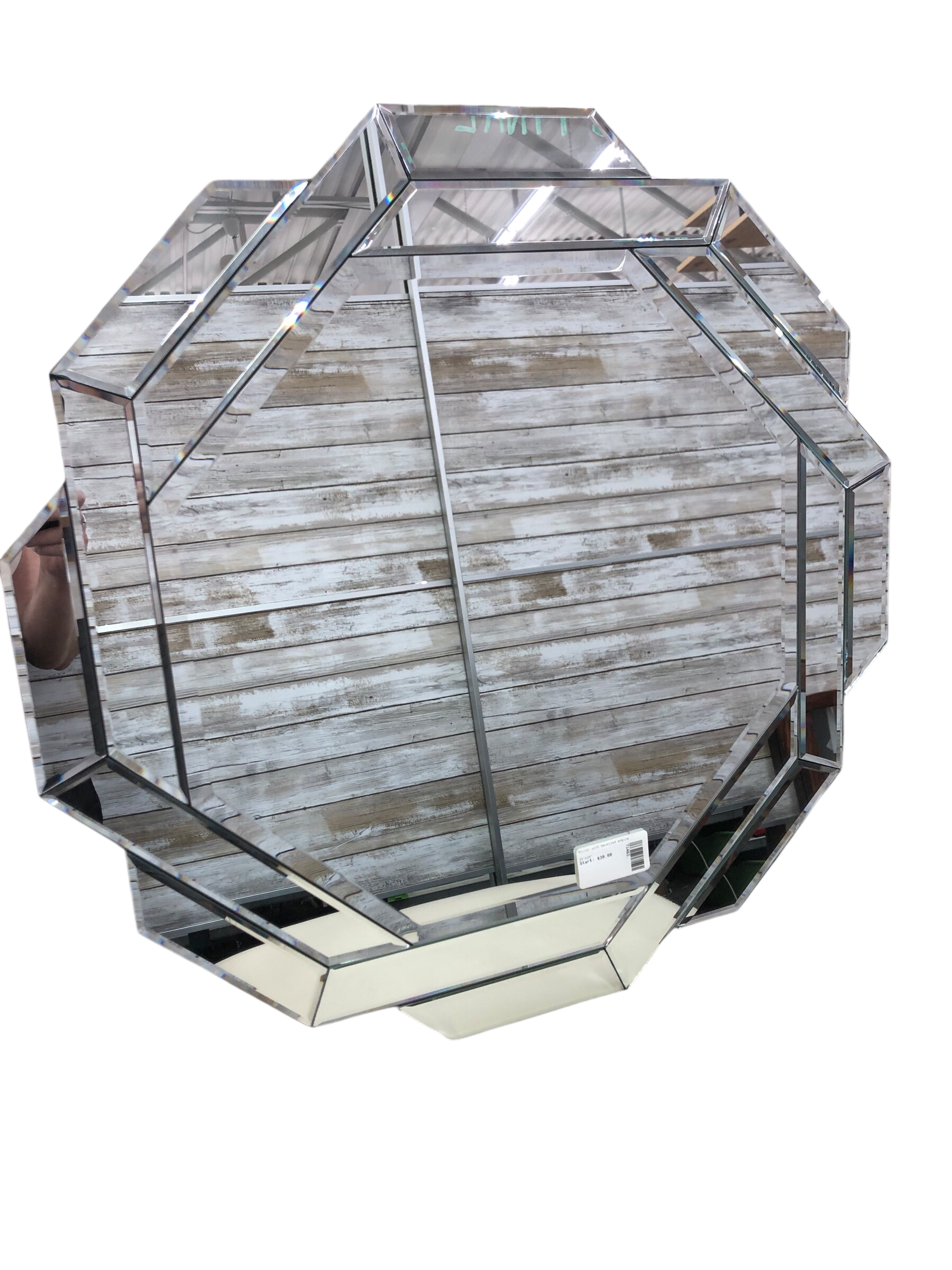 Mirror with bevelled edging